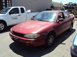 1995 TOYOTA CAMRY 4 DOOR SEDAN LE MODEL 2.2L AT FWD COLOR RED STK Z13436