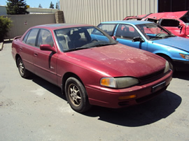 1995 TOYOTA CAMRY 4 DOOR SEDAN LE MODEL 2.2L AT FWD COLOR RED STK Z13436