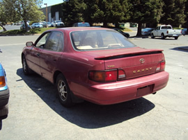 1995 TOYOTA CAMRY 4 DOOR SEDAN LE MODEL 2.2L AT FWD COLOR RED STK Z13436