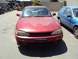 1995 TOYOTA CAMRY 4 DOOR SEDAN LE MODEL 2.2L AT FWD COLOR RED STK Z13436