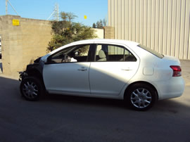 2009 TOYOTA YARIS 4 DOOR SEDAN 1.5L AT FWD COLOR WHITE  Z13469