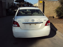 2009 TOYOTA YARIS 4 DOOR SEDAN 1.5L AT FWD COLOR WHITE  Z13469