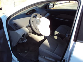 2009 TOYOTA YARIS 4 DOOR SEDAN 1.5L AT FWD COLOR WHITE  Z13469