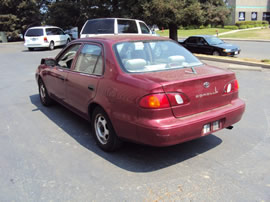 1999 TOYOTA COROLLA 4 DOOR SEDAN VE MODEL 1.8L AT 3 SPEED COLOR RED Z13490