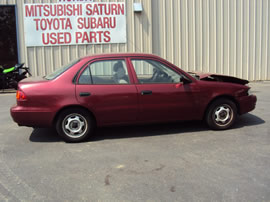 1999 TOYOTA COROLLA 4 DOOR SEDAN VE MODEL 1.8L AT 3 SPEED COLOR RED Z13490