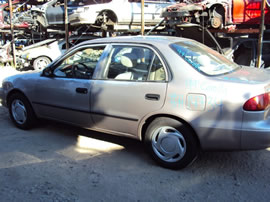 1999 TOYOTA COROLLA 4 DOOR SEDAN VE MODEL 1.8L AT 3 SPEED FWD COLOR PURPLE Z14734