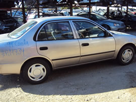 1999 TOYOTA COROLLA 4 DOOR SEDAN VE MODEL 1.8L AT 3 SPEED FWD COLOR PURPLE Z14734