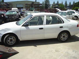 1999 Toyota corolla 4cyl 4 door white