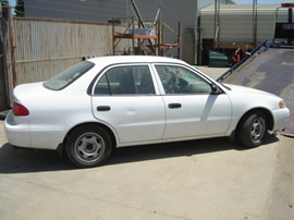 1999 Toyota corolla 4cyl 4 door white