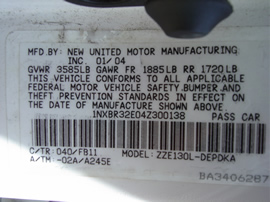 2004 Toyota corolla door white