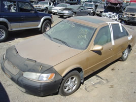 1997 TOYOTA CAMARY ENGINE: 2.2L AUTOMATIC COLOR: GOLD STK:Z09027