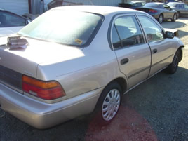 1994 TOYOTA COROLLA ,4 CYL ,AUTOMATIC, COLOR:GOLD STK;Z09033