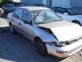 1994 TOYOTA COROLLA ,4 CYL ,AUTOMATIC, COLOR:GOLD STK;Z09033