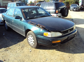 1995 TOYOTA CAMRY 4CYL, AUTOMATIC TRANSMISSION, COLOR GREEN, STK # Z10141