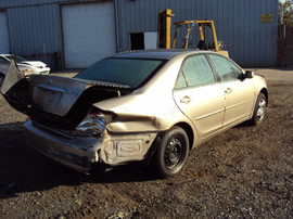 2003 TOYOTA CAMRY LE MODEL 4DR,2.4L AT FWD COLOR GOLD STK # Z11206