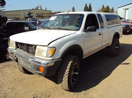 1999 TOYOTA TACOMA XTRA CAB DLX MODEL 3.4L V6 WITH TRD SUPERCHARGER MT 4X4 WITH REAR DIFF LOCK COLOR WHITE STK Z13384