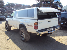 1999 TOYOTA TACOMA XTRA CAB DLX MODEL 3.4L V6 WITH TRD SUPERCHARGER MT 4X4 WITH REAR DIFF LOCK COLOR WHITE STK Z13384