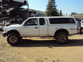 1999 TOYOTA TACOMA XTRA CAB DLX MODEL 3.4L V6 WITH TRD SUPERCHARGER MT 4X4 WITH REAR DIFF LOCK COLOR WHITE STK Z13384