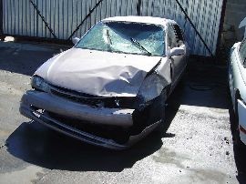 2000 Toyota corolla  4 door sedan 1.8l at fwd color purple