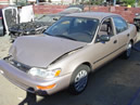 1994 TOYOTA COROLLA ,4 CYL ,AUTOMATIC, COLOR:GOLD STK;Z09033